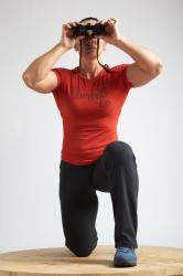 ANGELINA KNEELING POSE WITH SPYGLASS